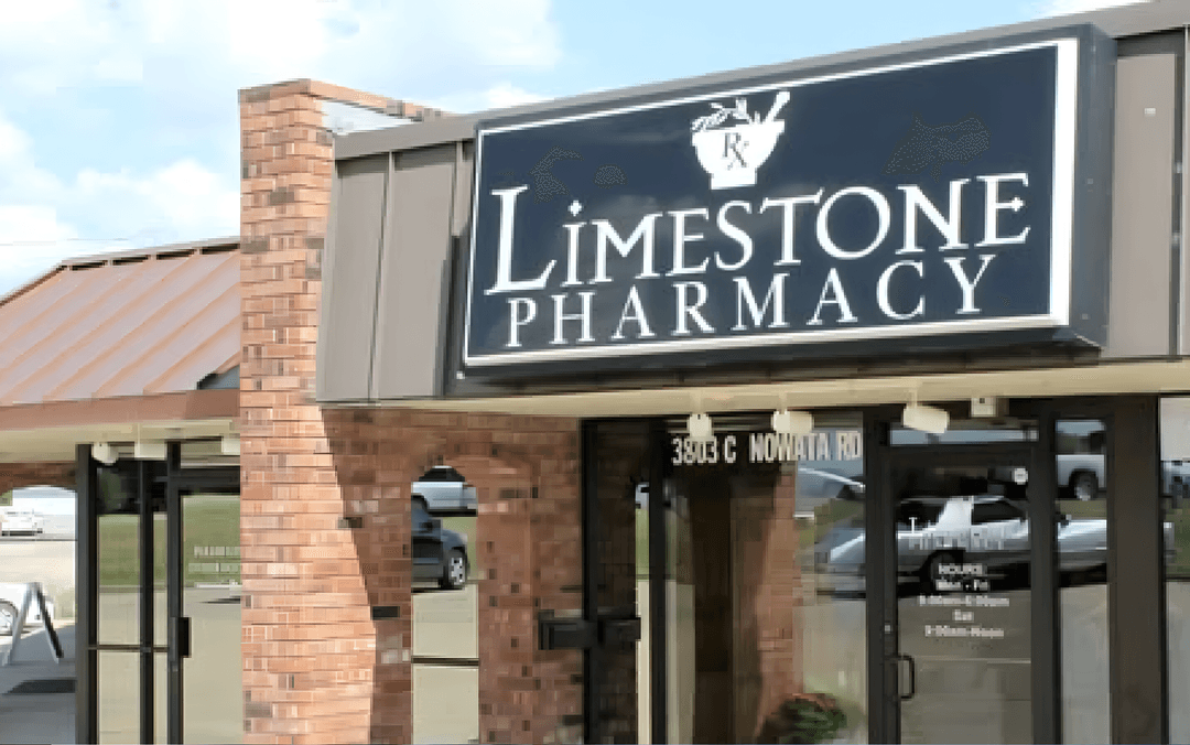 Limestone Pharmacy team helping a customer